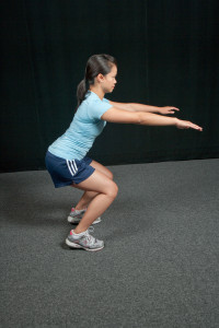 Squatting with knees in front of toes